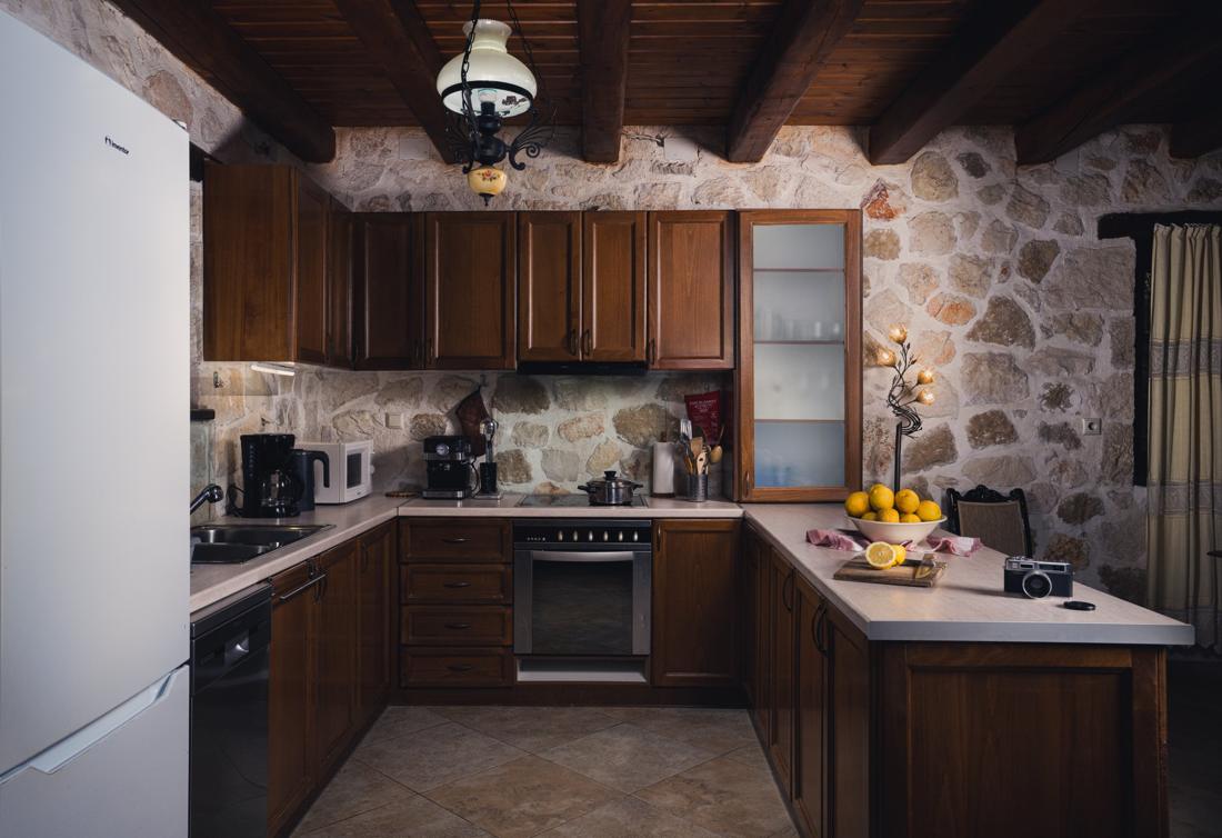 Kitchen with white countertops and cabinets