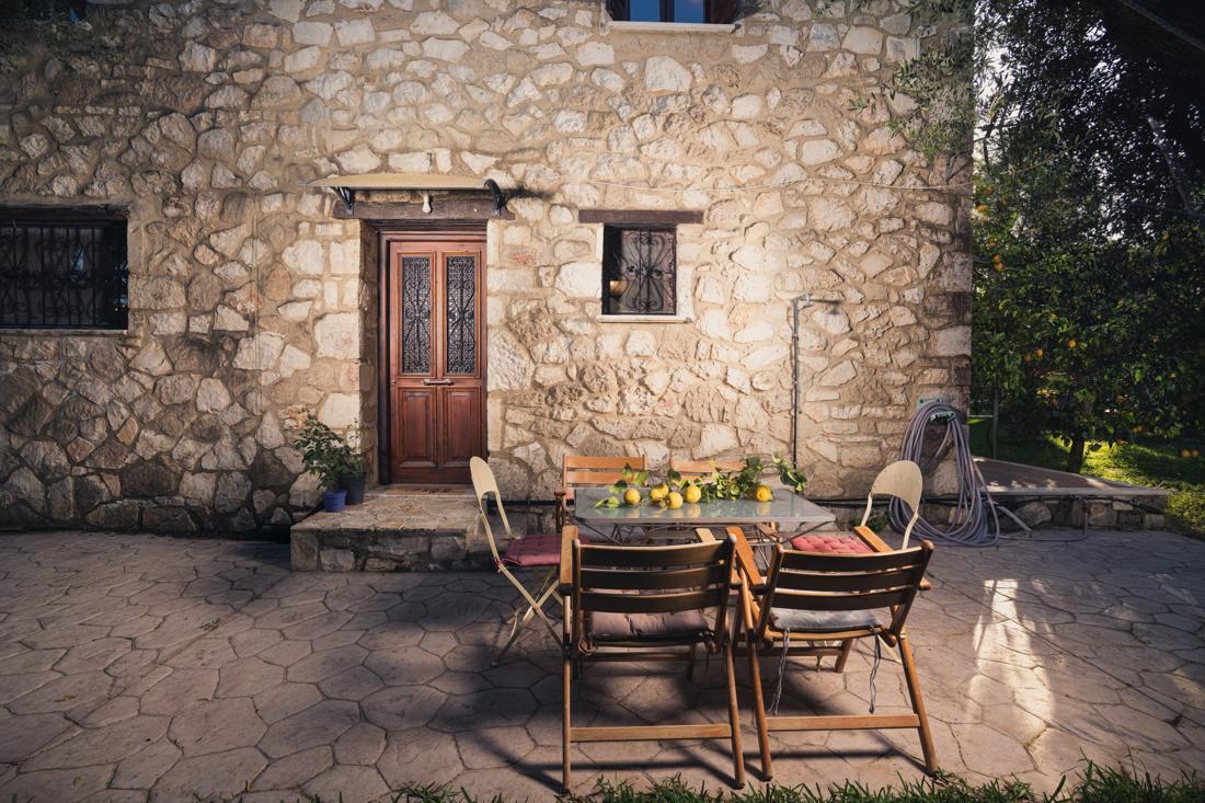 Stone doorway with an outdoor dining table